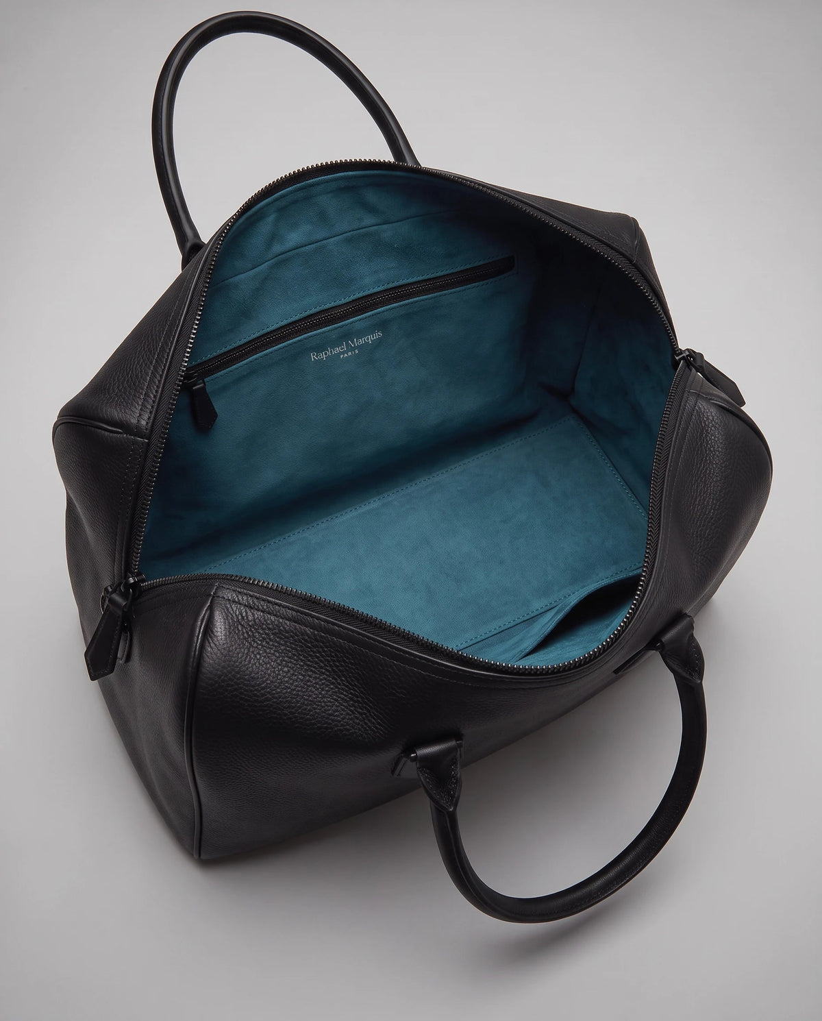 Principal Traveller in black, interior open