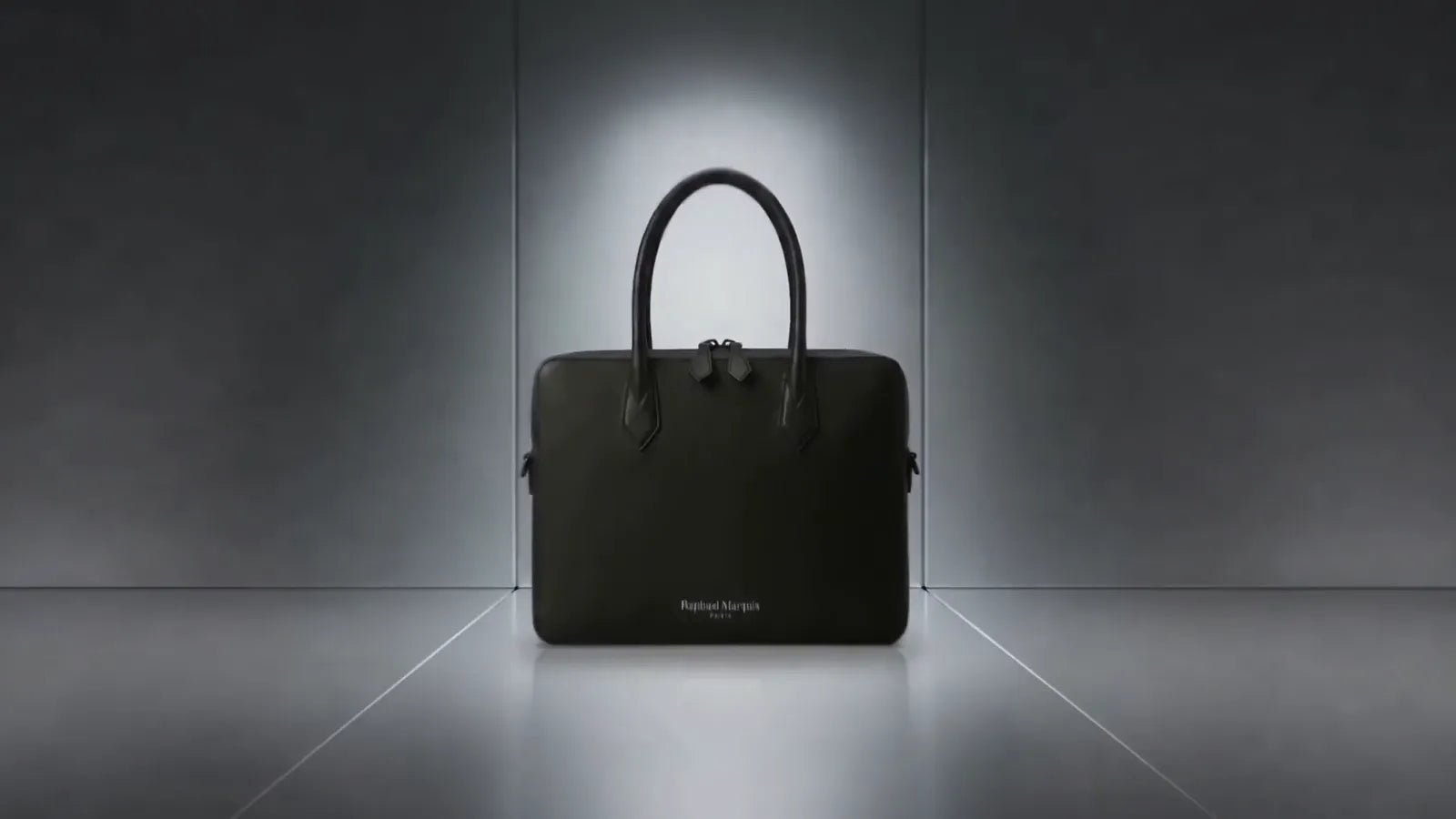 The Principal Collection by Raphael Marquis, black pieces in a metallic chamber